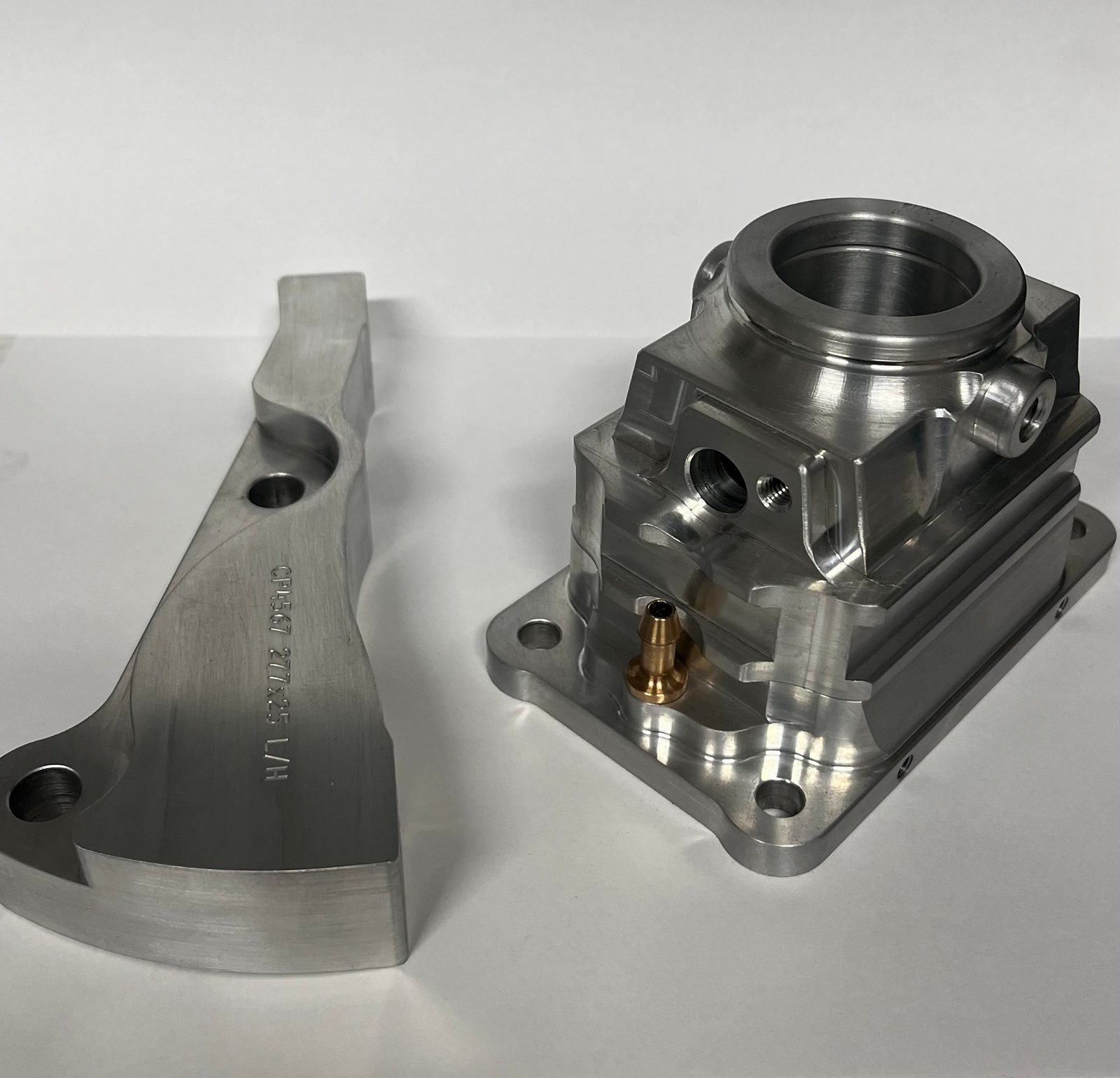 Machined aluminium suspension arm and housing