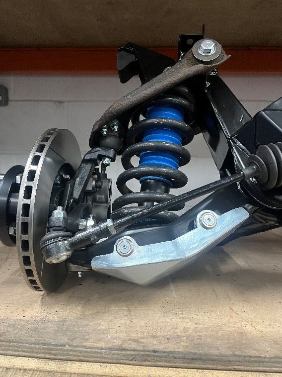 Coilover and upright assembly with blue spring